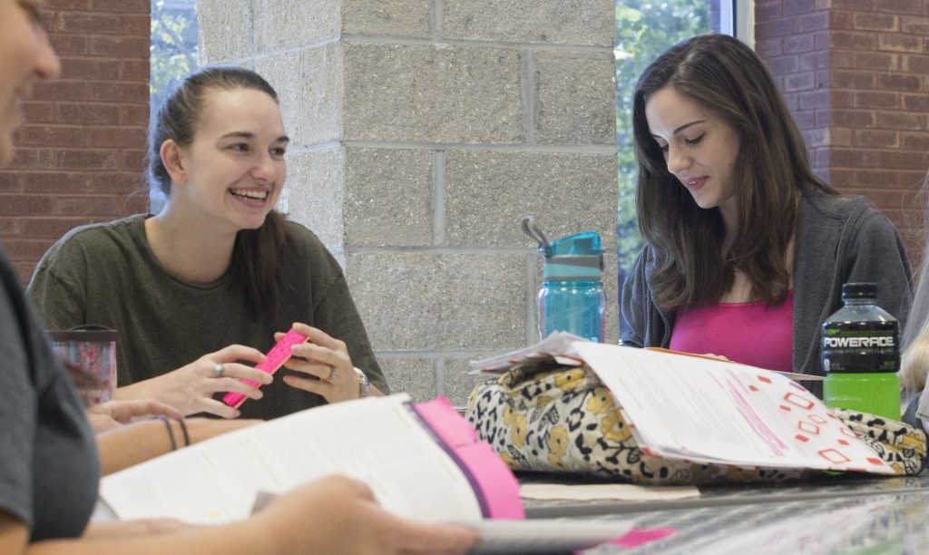 students studying together in student center.