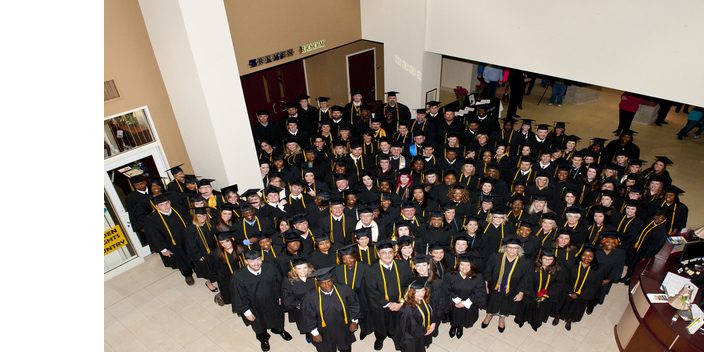 students in graduation gowns