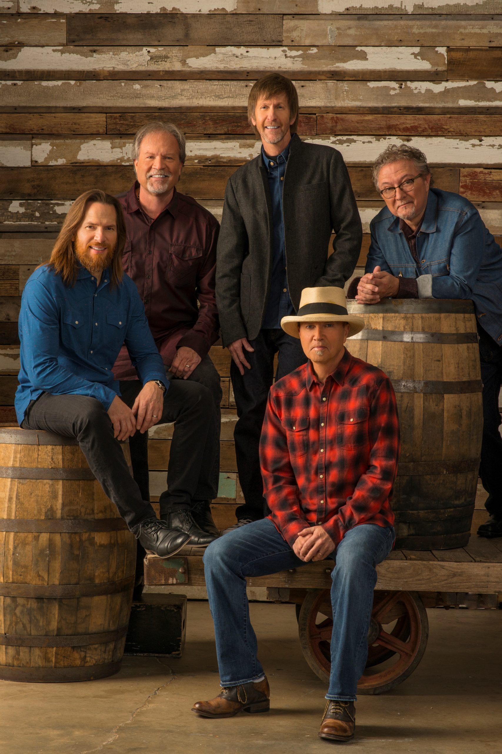 Sawer Brown band sitting with barrels