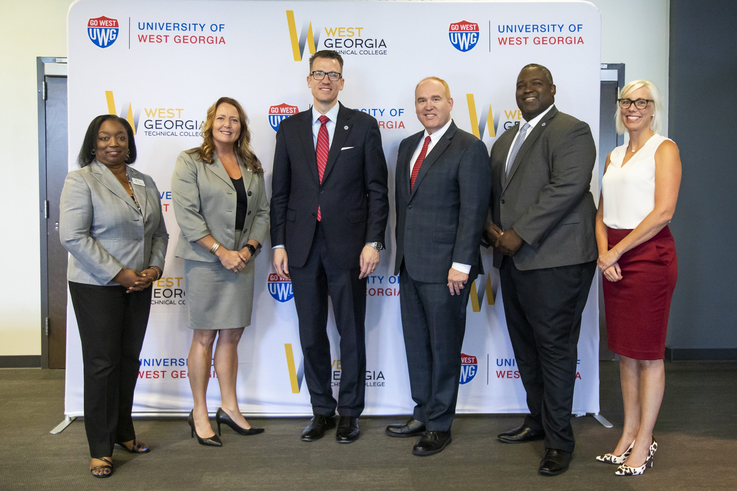 Dr. Tonya Whitlock, West Georgia Technical College’s vice president for Student Affairs; WGTC President Dr. Julie Post; University of West Georgia President Brendan Kelly; UWG Provost Dr. Jon Preston; André L. Fortune, UWG’s vice president for Student Affairs and Enrollment Management; and Dr. Meredith Brunen, vice president for University Advancement and CEO of UWG Foundations standing together