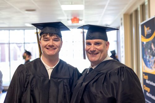 Father and son graduate together