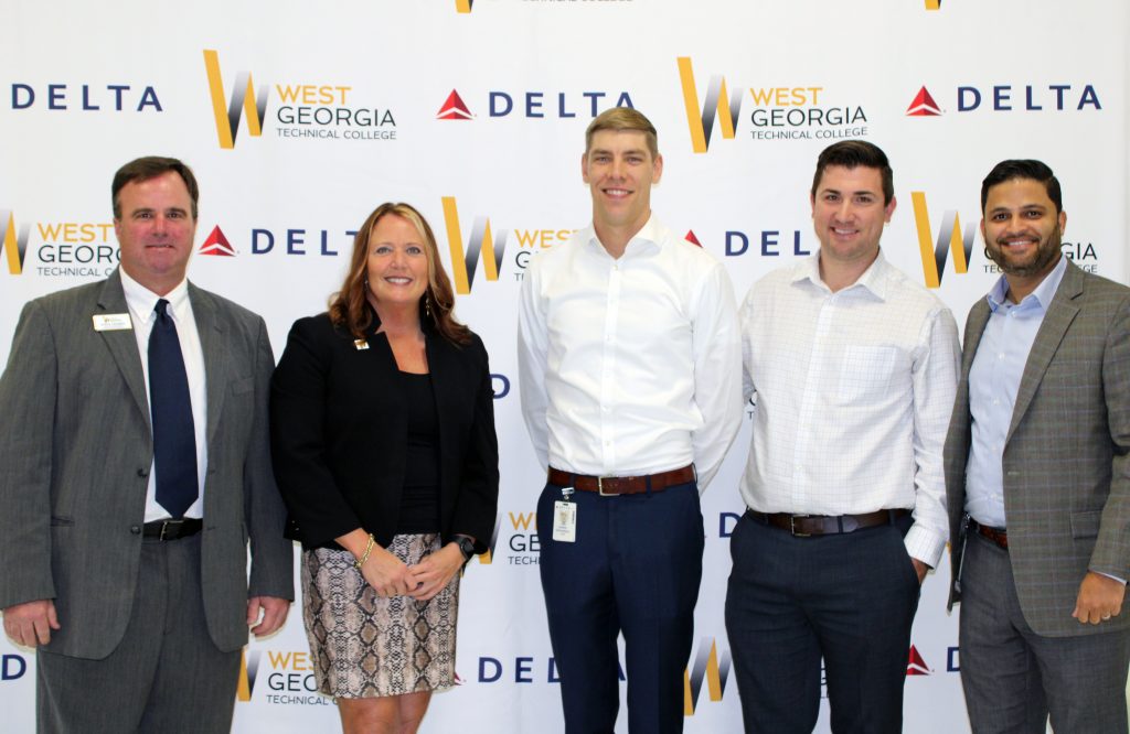 WGTC and Delta employees standing