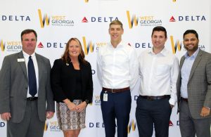 WGTC and Delta employees standing