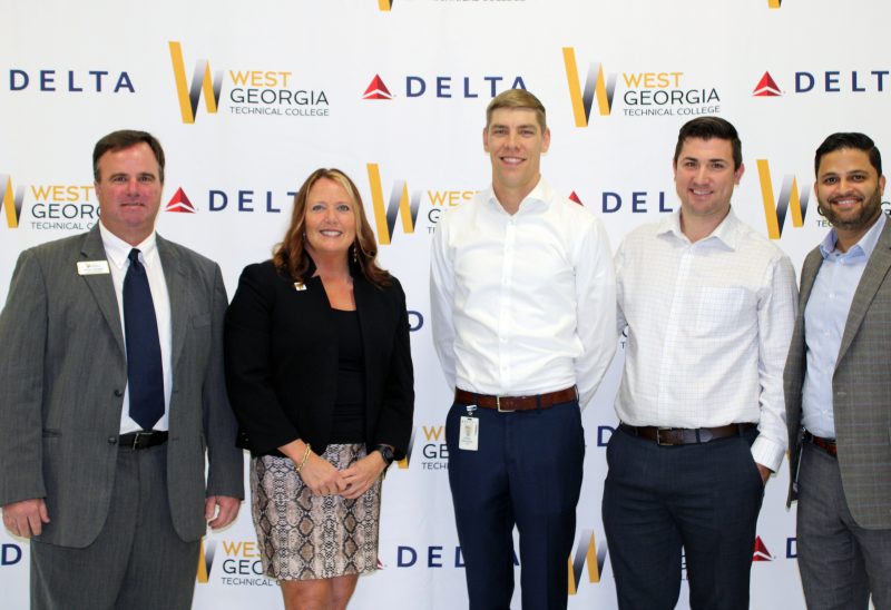 WGTC and Delta employees standing