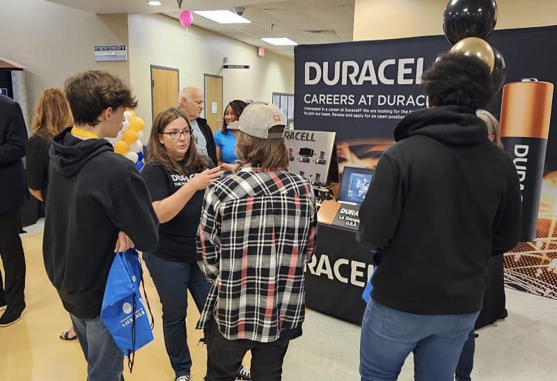 Students speak with representatives from Duracell during West Georgia Manufacturing Day