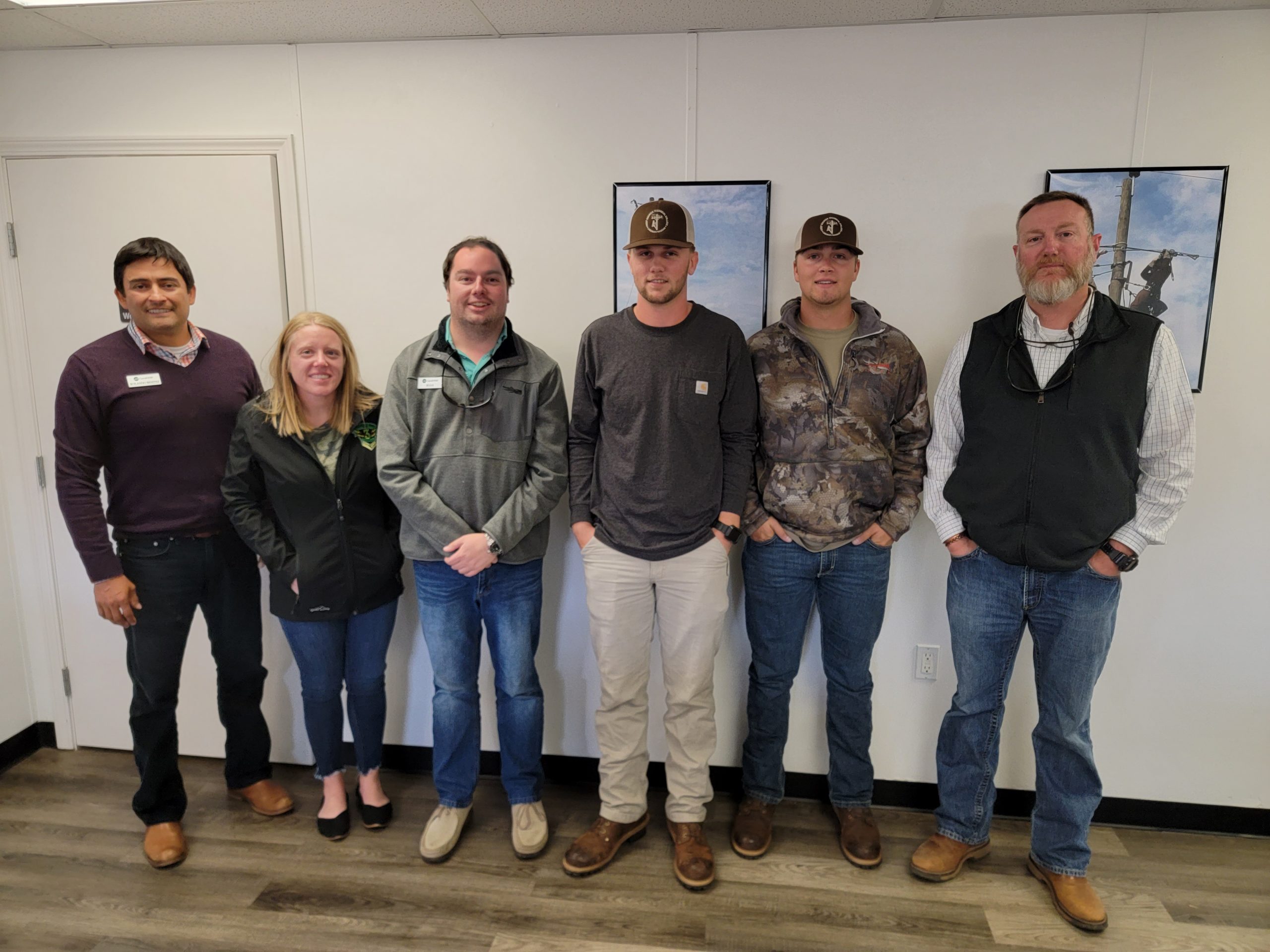 lineman graduates standing