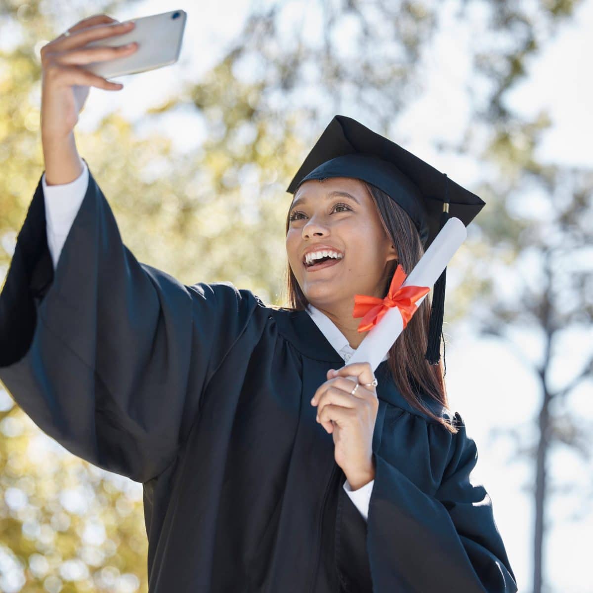 graduate taking a selfie