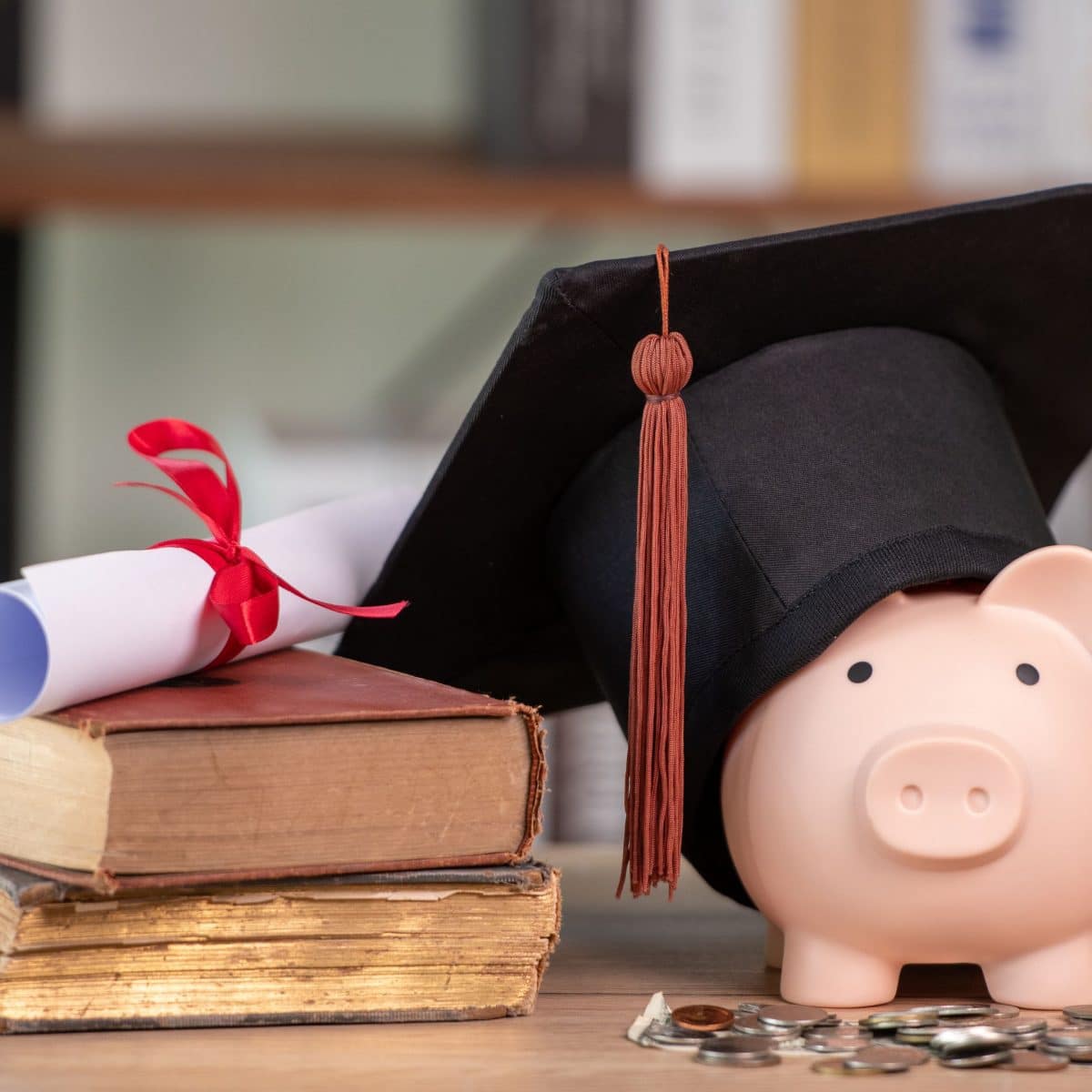 piggy bank with graduation cap on