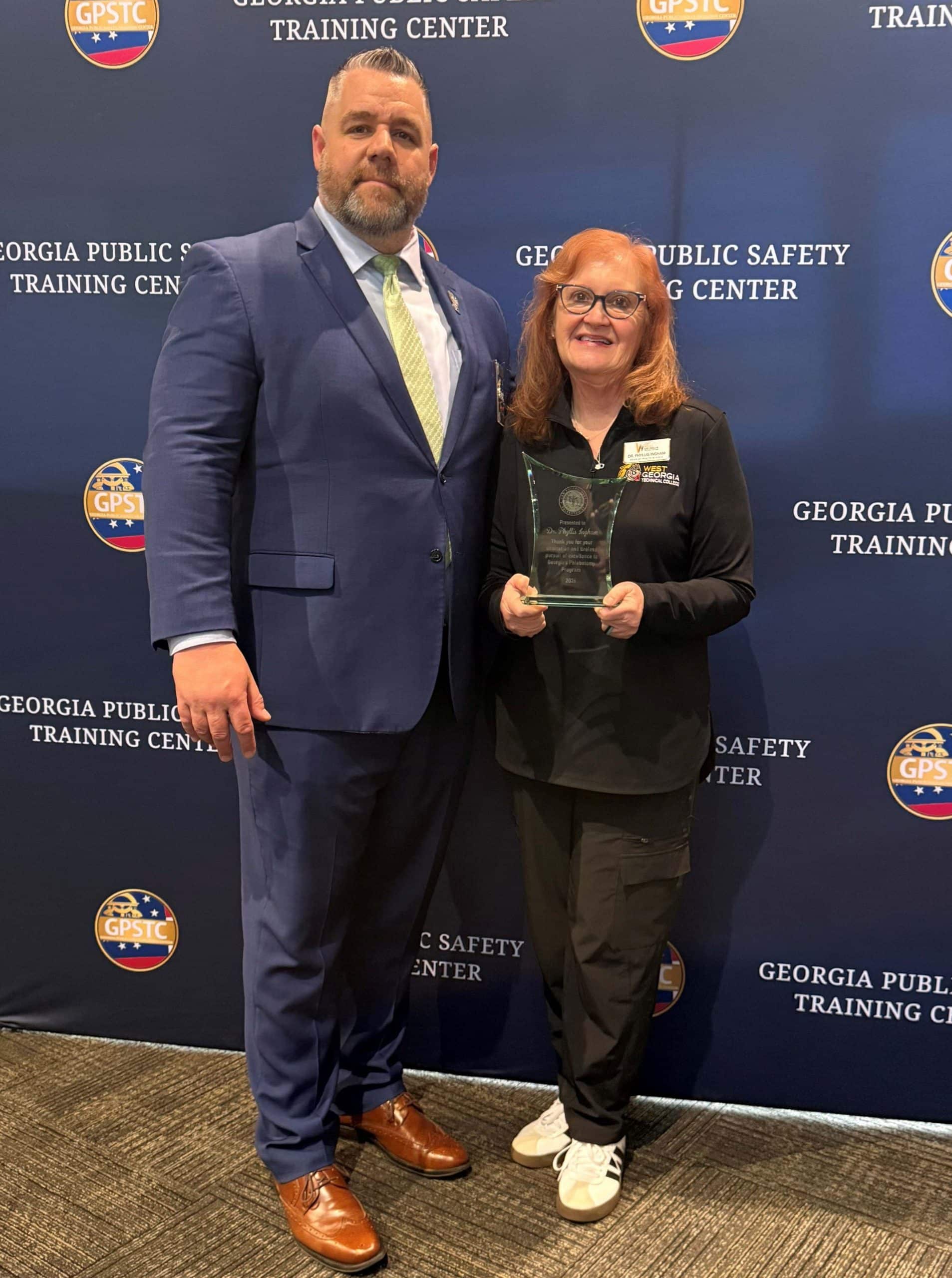 Phyllis Ingham accepting Award