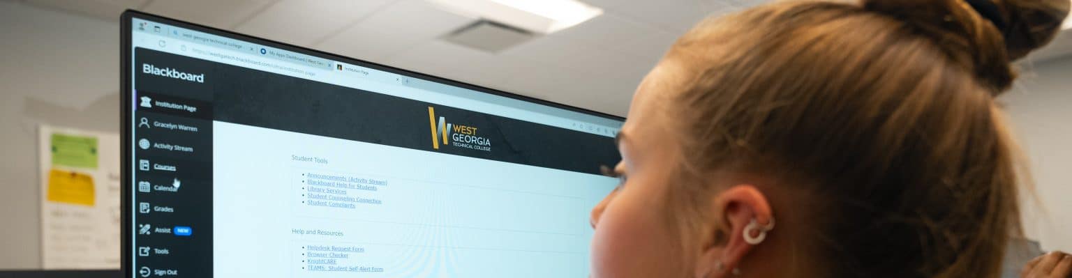 Student looking at Blackboard