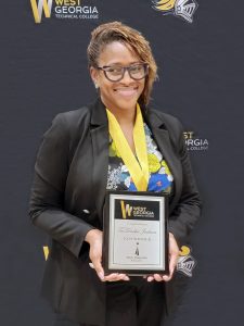 TaTanisha Jackson with award