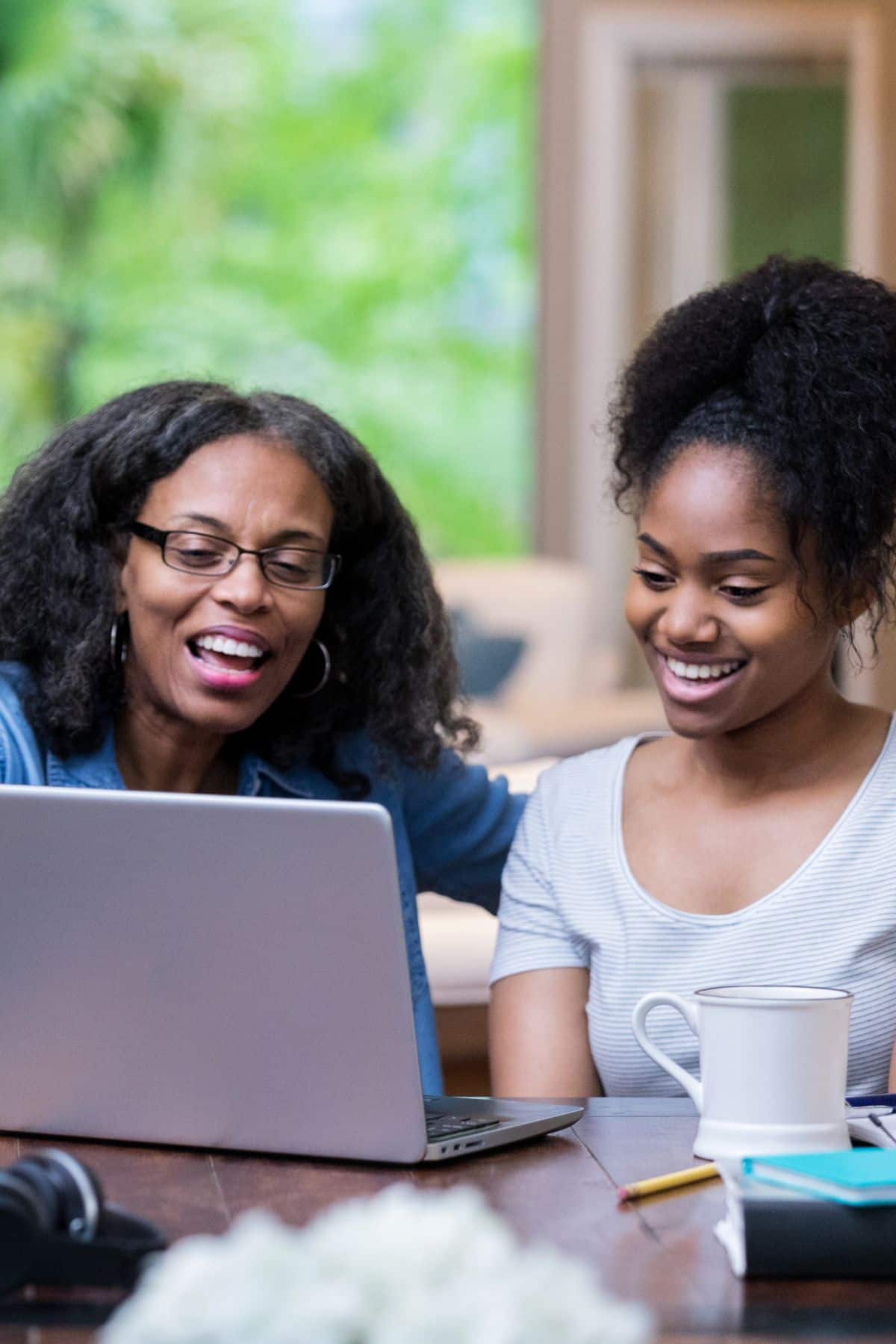 Mom and student looking at a compter