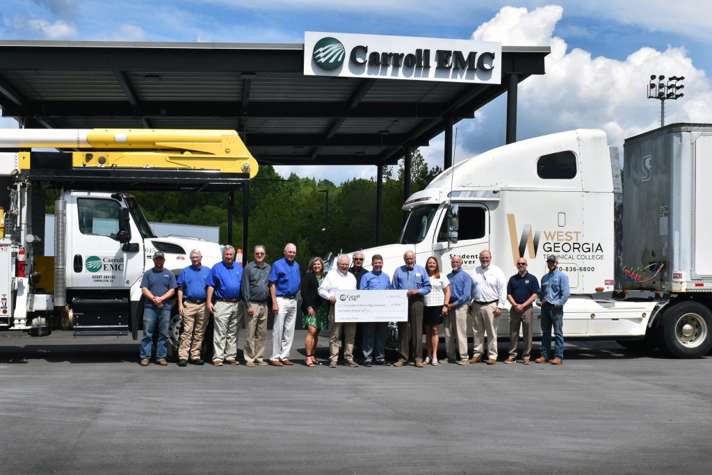 Carroll EMC Donators in front of truck