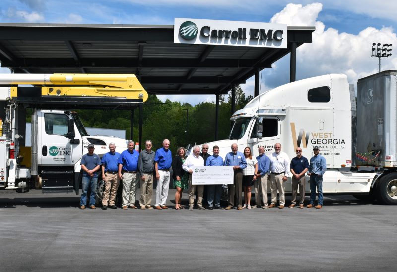 Carroll EMC Donators in front of truck