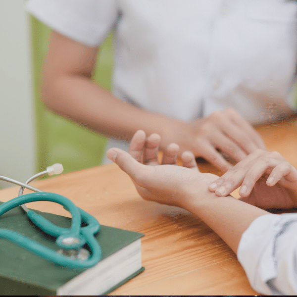 person checking someone's pulse