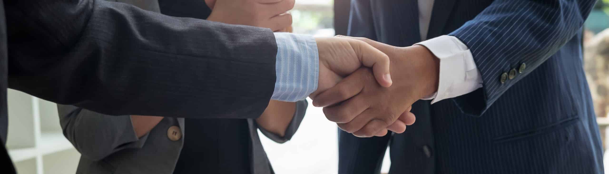 two people shaking hands