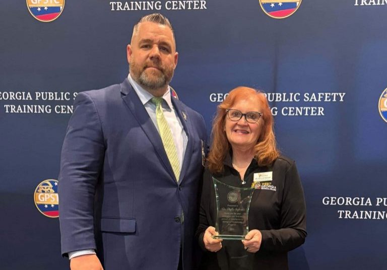 Phyllis Ingham accepting Award