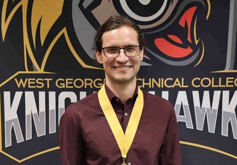 Pilon Matthieu Pilon holding award